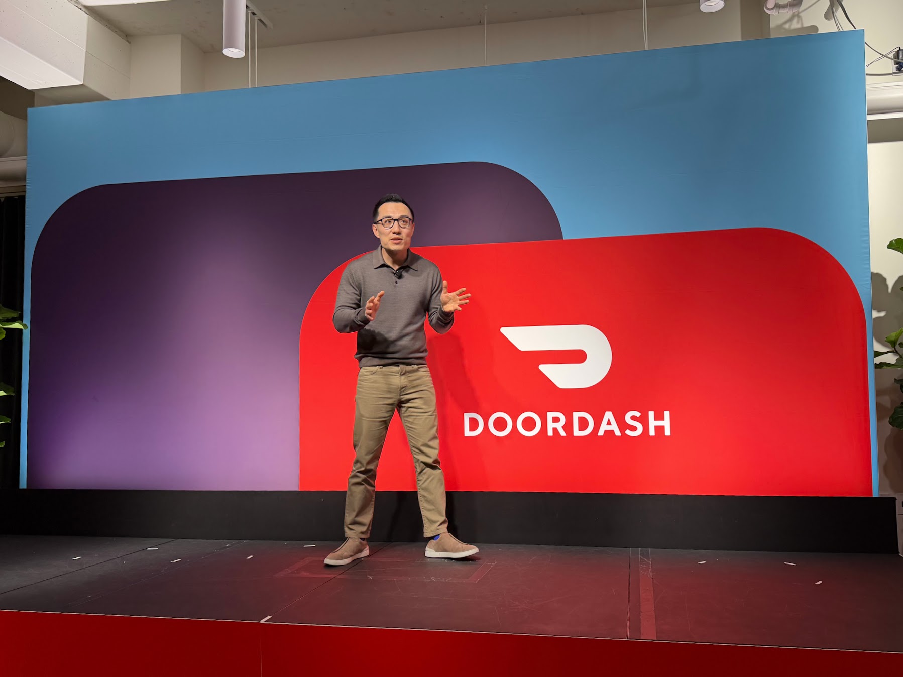 DoorDash CEO Tony Xu speaking at the Dash Forward event in San Francisco